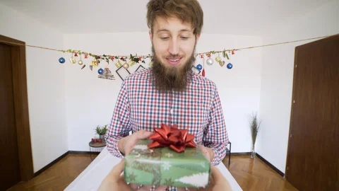 POV man receiving present and getting upset in authentic room. Stock Footage 102655885