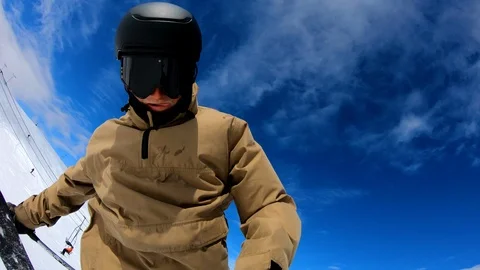 POV man skiing doing extreme backflip off jump on sunny winter day Stock Footage 105022422