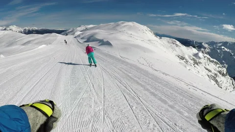 POV Of Man Skiing Down Snowy Hill Stock Footage 140100083