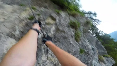 POV - a man slips while climbing, recovers and continues up Stock-Footage 87452700