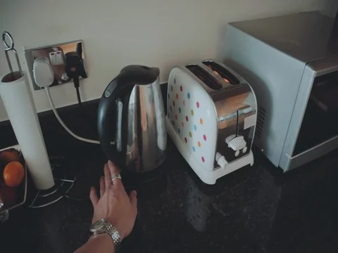 POV of man switching on a Kettle Stock Footage 74664689