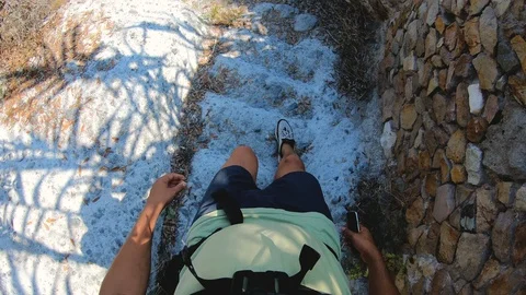 POV man walking down the stone stair path to amazing bay on Ponza Island coast 스톡 동영상 117234403