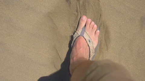 POV Man walking in in flip-flops on the desert in slow motion 180fps Stock Footage 165042811