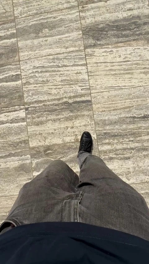POV Man Walking On Marble Tile Floor Stock Footage 344038366