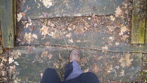 POV man walking over old wood bridge, Heuchlingen, Germany. Stock Footage 102646781