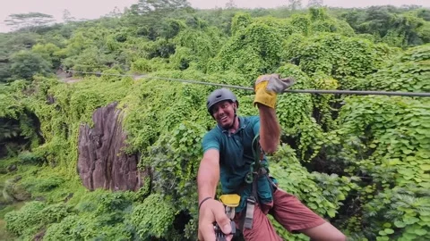 POV Man Zip lining Through Jungle Canopy in Mahe, Seychelles 003 Stock Footage 340298194