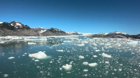 POV melting ice forms floating Pacific ocean Alaska Stock Footage 98617115