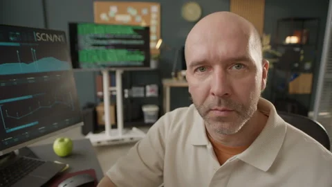 POV of Middle-Aged Male Programmer Working on Computer in Office Stock Footage 306843075