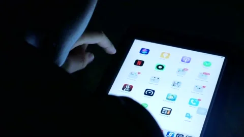 POV to mobile phone tablet while a finger touching on mobile phone tablet Stock Footage 130328971