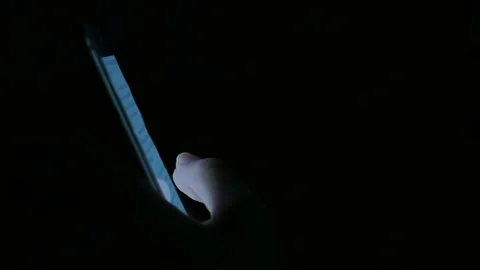 POV to mobile phone tablet while a finger touching on mobile phone tablet Stock Footage 130329680