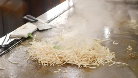POV motion while chef is cooking stir fried bean sprout of Yasai Itame frie.. Stock Footage 313431998