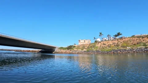 POV Moving Under Bridge At Carlsbad Lagoon California On Clear Sunny Day Stock Footage 331765722