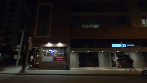 POV night side view downtown Toronto city in COVID 19  pandemic lockdown Vídeo Stock 146387125