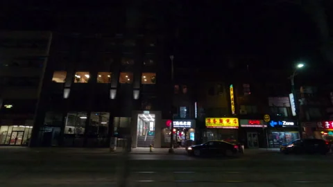 POV night side view downtown Toronto city in COVID 19  pandemic lockdown Vídeo Stock 146413076