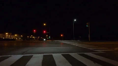 POV nights driving on empty city streets near in COVID 19  pandemic lockdown Vidéo 146492178