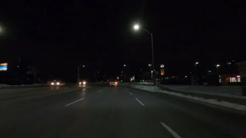 POV nights driving on empty city streets near in COVID 19  pandemic lockdown Vidéo 146493107