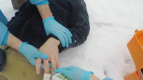 POV of Paramedic Checking Pulse of Patient Stock Footage 123692142
