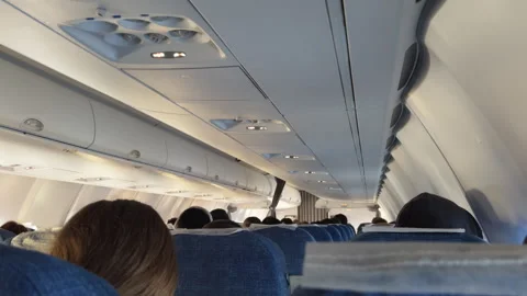 Pov of a passenger flying in passenger plane. Moment of flight in an airplane Stock Footage 296340553