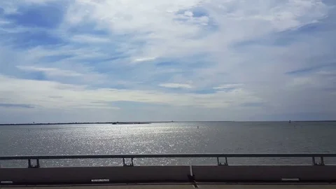 POV-Passenger side window driving causeway to Galveston Texas Video stock 71229543