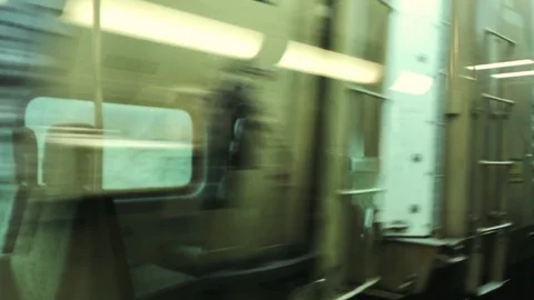 POV passenger view looking out window of train at fast passing freight car. Stock Footage 88193003