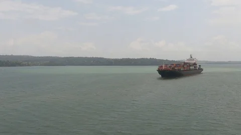 POV-Passing Container ship JPO Libra in Gatun Lake in Panama Canal Stock Footage 108543997