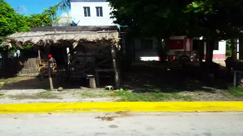 POV-Passing roadside structures and vegetation in rural Costa Maya Mexico Stock Footage 58782199
