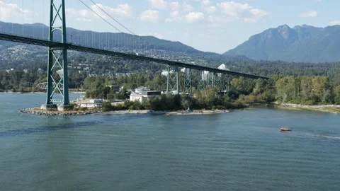 POV-Passing under the Lions Gate Bridge over the entrance to Vancouver Harbor Stock Footage 208235271