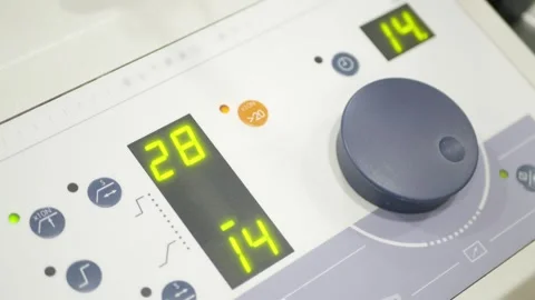 Pov to the pelvic traction machine status screen while running machine oper.. Stock Footage 301274643