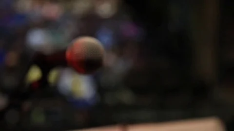 POV of performer walking up to microphone on stage Stock Footage 82318364