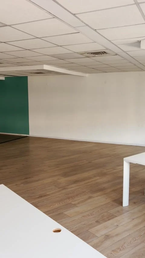 POV from phone ugc content of empty indoor vacant office lot or floor in Stock-Footage 334129864