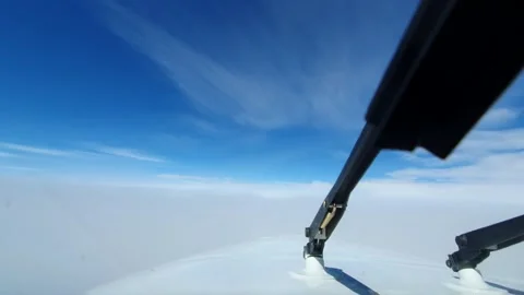 POV pilot view aircraft breaks through white cloud from overcast bright light Vidéo 313897181