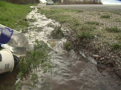 POV of plastic bag in run off Stock-Footage 609789