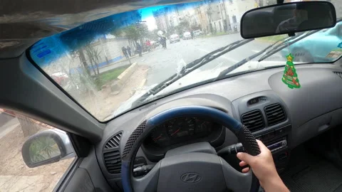 POV point of view activating the windshield wiper.  Stock Footage 140414228