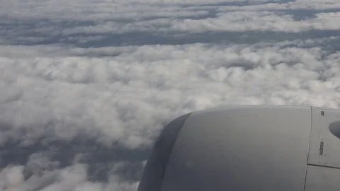 POV Point of view airplane flight air plane engine in rainy clouds formation day Stock Footage 81988046