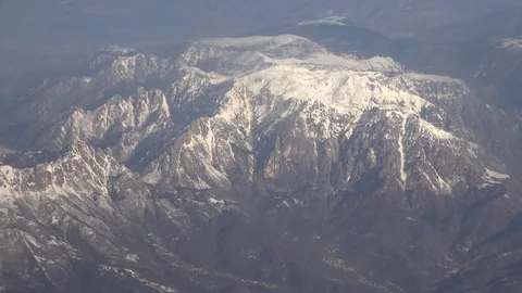POV Point of view airplane transit mountain top landscape by day wild coastline Stock Footage 81987973