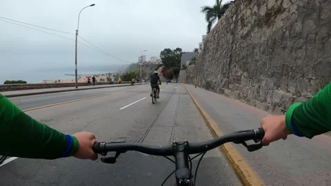 POV point of view cycling down the beach circuit in Chorrillos on a Sunday Video stock 142172830