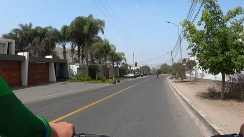 Pov point of view cycling down the street el peñon in la planicie Video stock 143047259
