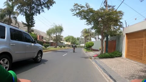 Pov point of view cycling down the street el peñon in la planicie Stock Footage 143095308