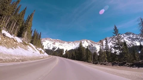 POV point of view - Driving over Loveland pass in Early Spring. Stock Footage