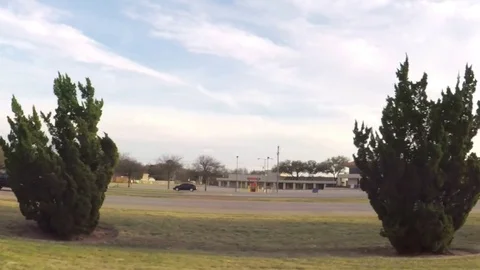Pov. Point of view - Driving through the city in spring time. Stock Footage 73899743