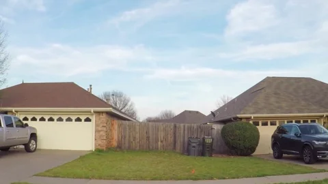 Pov. Point of view - Driving through residential neighborhood in spring time. Vídeos de archivo 73899947