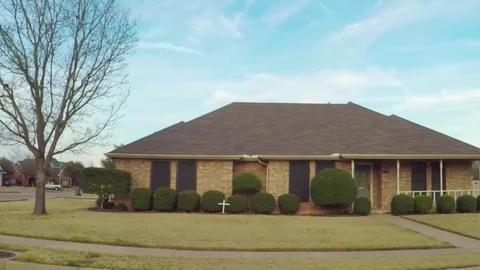 Pov. Point of view - Driving through residential neighborhood in spring time. Stock Footage 73899954