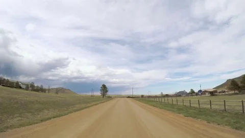POV point of view - Driving through countryside in Eastern Colorado. Stock Footage