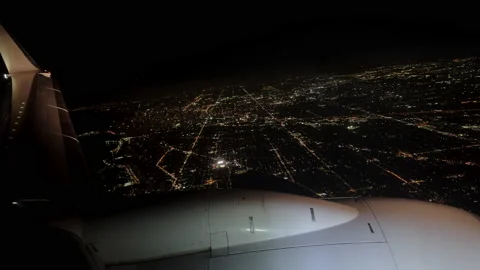 POV point of view inside airplane passenger window seat night time vire Stock Footage 208234065