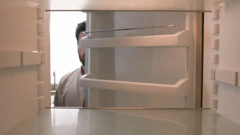POV point of view from inside refrigerator Caucasian hungry funny man adult Stock Footage 273051882