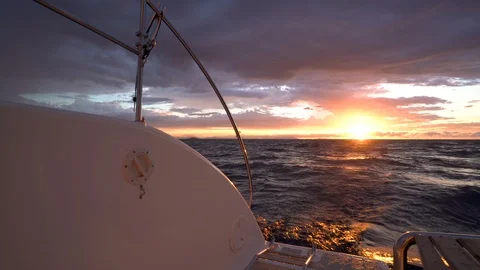 POV Point of View looking off back of moving yacht at  beautiful sunset Vídeos de archivo 101651439