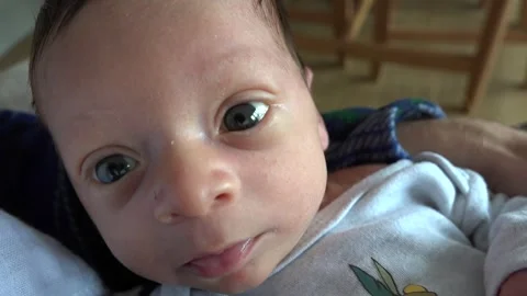 POV, Point of View, Looking down at New Born Baby, Holding baby in arms Stock Footage 253101670