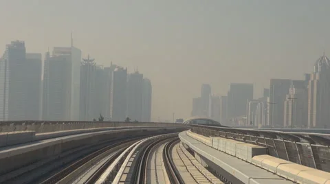 POV Point of view metro train transport misty day Dubai downtown new residential Video stock 55015166