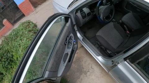 POV point of view opening a car door to get in and start 库存影片 140415244