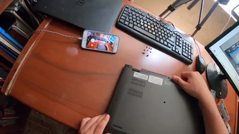 Pov point of view opening a laptop at home watching tutorials Stock Footage 147459223